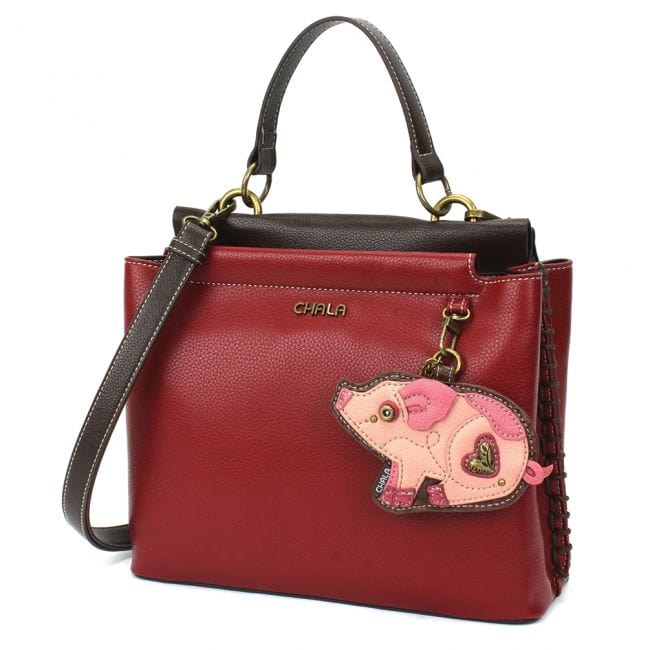 https://cdn.shopify.com/s/files/1/0016/1300/4872/products/chala-keychain-satchel-red-pig-collection-by-chala-new-piggies-vegan-38109299933422.jpg?v=1731060511