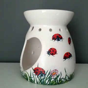 https://cdn.shopify.com/s/files/1/0016/1300/4872/files/faire-simply-imperfected-decor-ladybug-ceramic-wax-warmers-handmade-in-the-uk-40577946386670.webp?v=1731172481