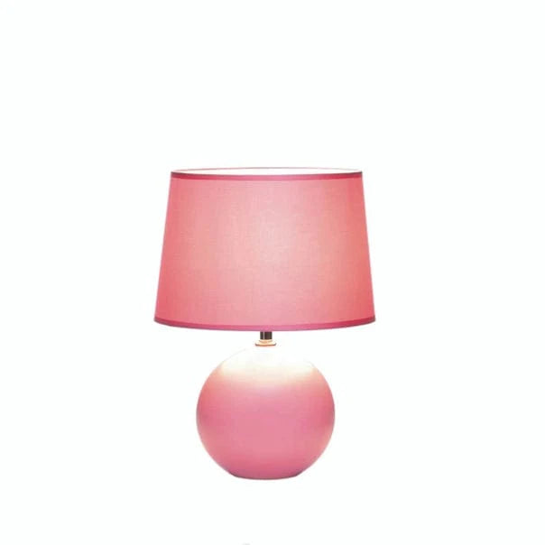 https://cdn.shopify.com/s/files/1/0016/1300/4872/files/faire-zingz-home-table-lamp-pink-round-base-table-lamp-40316585083118.webp?v=1731221965