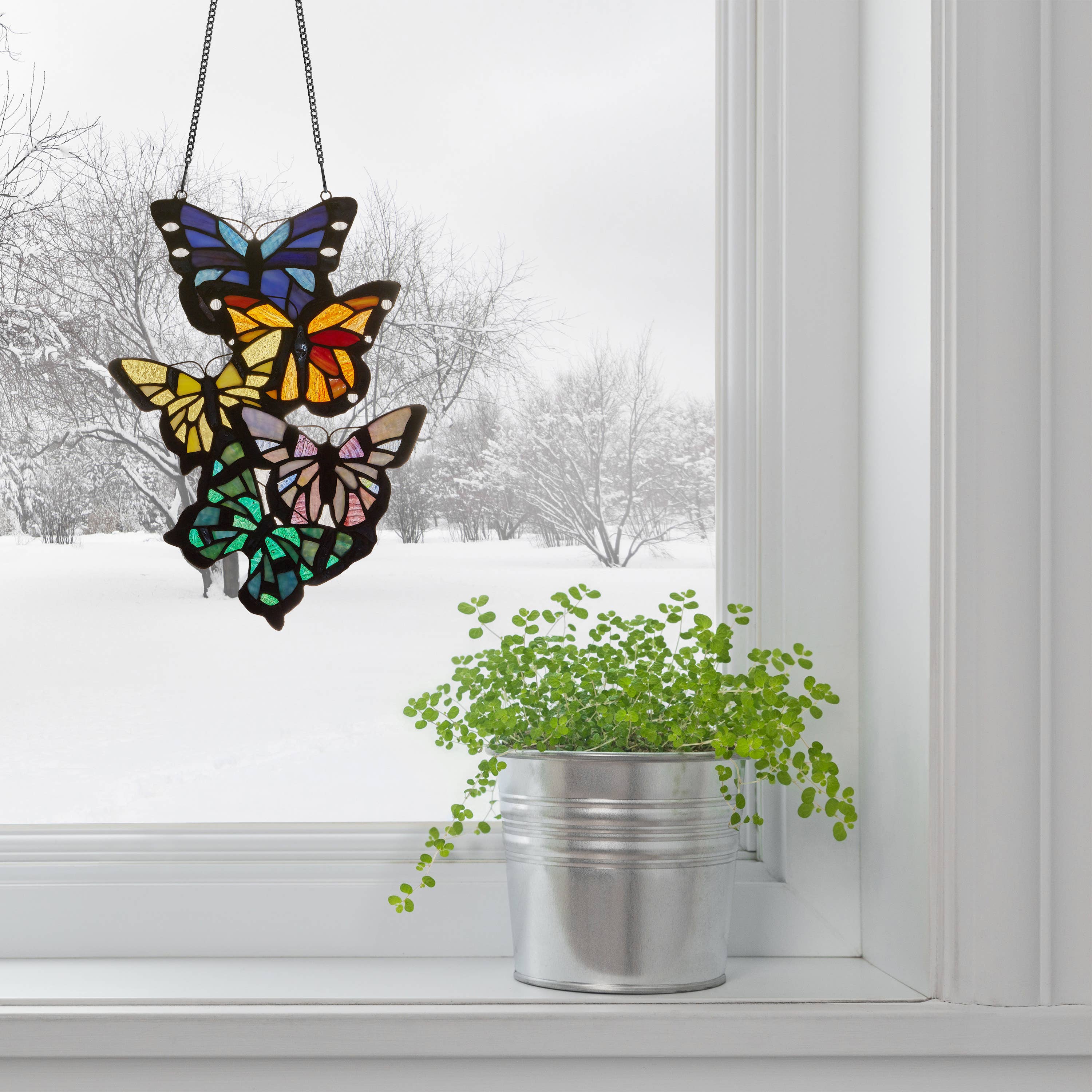 https://cdn.shopify.com/s/files/1/0016/1300/4872/files/river-of-goods-river-of-goods-13-25-h-butterfly-cluster-stained-glass-window-panel-1129246591.jpg?v=1739235934