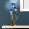 https://cdn.shopify.com/s/files/1/0016/1300/4872/files/river-of-goods-river-of-goods-21-h-blue-mercury-glass-3-lily-uplight-table-lamp-1212805664.jpg?v=1766441244